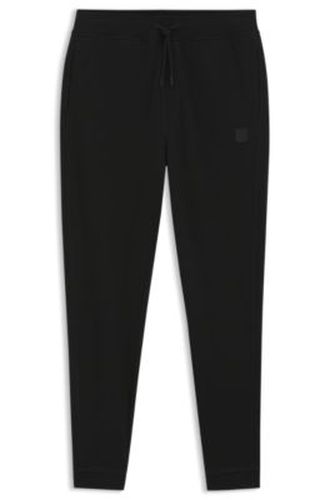 Bas de survêtement en molleton de coton avec patch logo - Boss - Modalova
