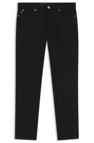 Jean Tapered en denim stretch noir - HUGO - Modalova