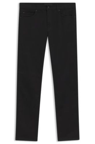 Jean coupe près du corps en denim extensible profond - HUGO - Modalova