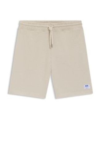 Short ample en coton mélangé à la structure gaufrée - HUGO - Modalova