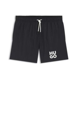 Short de bain à séchage rapide et logo imprimé empilé - HUGO - Modalova