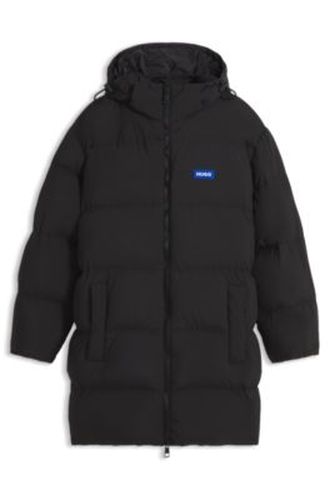 Veste matelassée déperlante Relaxed avec capuche ajustable - HUGO - Modalova