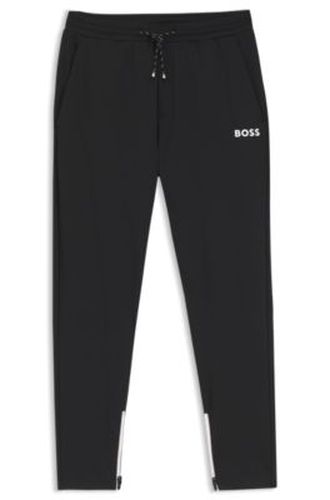 Active Bas de survêtement en gabardine stretch avec ourlets zippés - Boss - Modalova