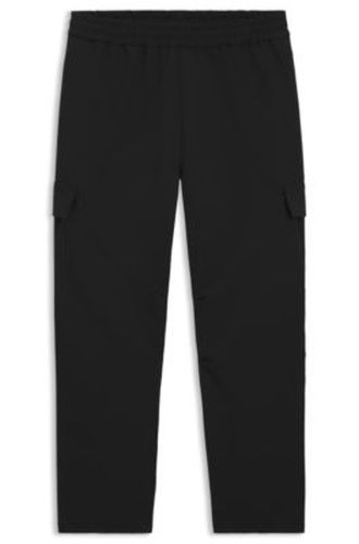 Pantalon Relaxed à poches cargo - HUGO - Modalova