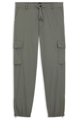 Pantalons cargo en tissu froissé déperlant - Boss - Modalova