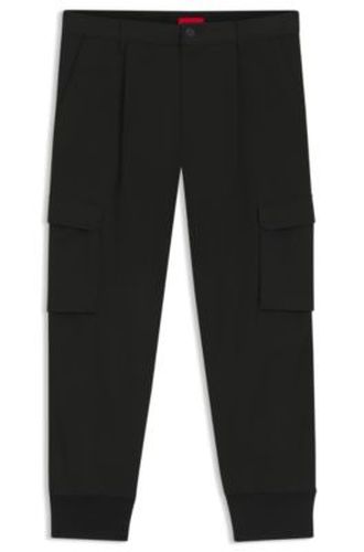 Pantalon Slim avec poches cargo - HUGO - Modalova