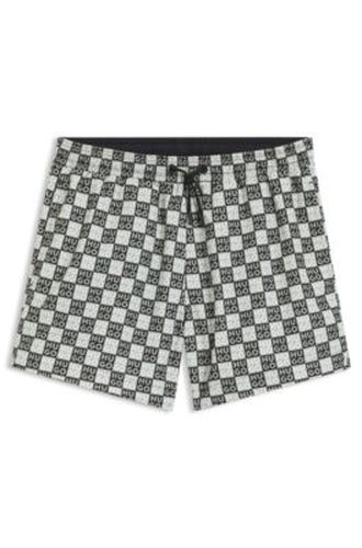 Short de bain à séchage rapide et imprimé à carreaux à logo empilé - HUGO - Modalova
