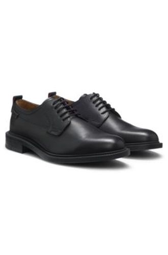Chaussures derby en cuir avec étiquette à logo - HUGO - Modalova