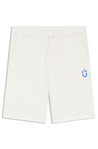 Short en coton éponge avec jacquard léopard - HUGO - Modalova