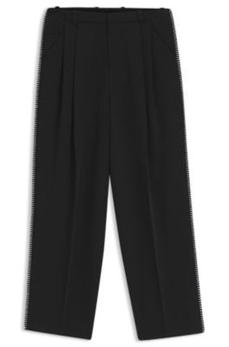 Pantalon à pinces avec détails au point de surjet - HUGO - Modalova