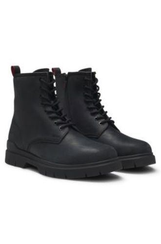 Bottines en cuir avec logo embossé - HUGO - Modalova