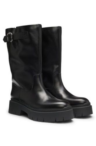 Bottines style motard en similicuir avec boucle - HUGO - Modalova