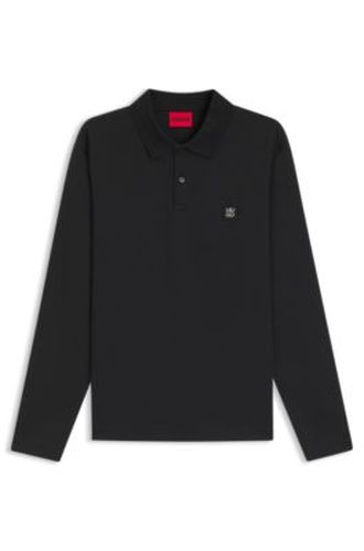 Polo en coton mélangé avec logo revisité - HUGO - Modalova