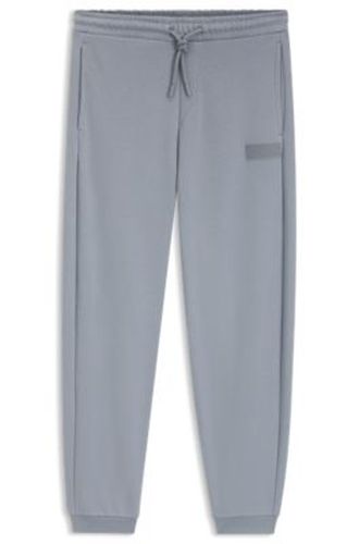 Pantalon Relaxed en molleton novateur - Boss - Modalova