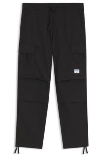Pantalon cargo Relaxed en coton ripstop - HUGO - Modalova
