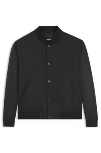 Blouson hydrofuge à manches monogrammées - Boss - Modalova