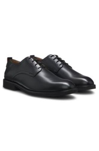 Chaussures derby en cuir avec logo en relief - HUGO - Modalova