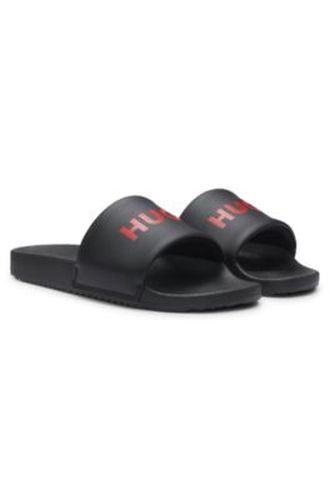 Mules avec bride rembourrée et logo contrastant - HUGO - Modalova