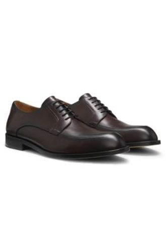 Chaussures derby en cuir avec logo en relief - Boss - Modalova