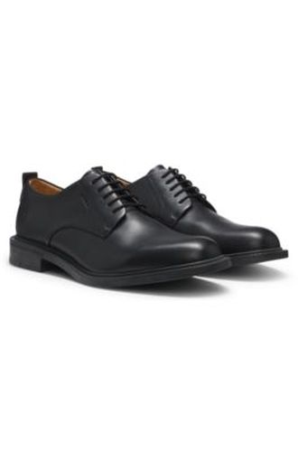 Chaussures derby en cuir avec logo en relief - HUGO - Modalova