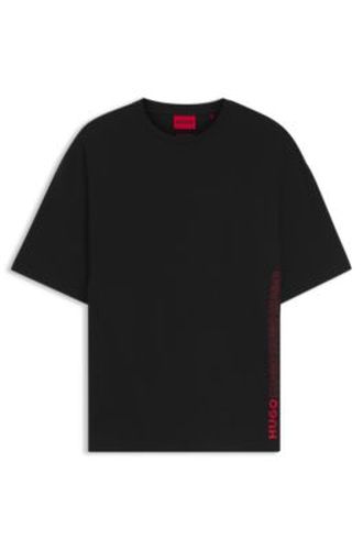 T-shirt Oversize en coton à imprimé logo répété - HUGO - Modalova