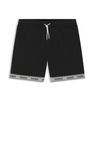 Short de bain en maille filet avec ruban logoté en jacquard - HUGO - Modalova