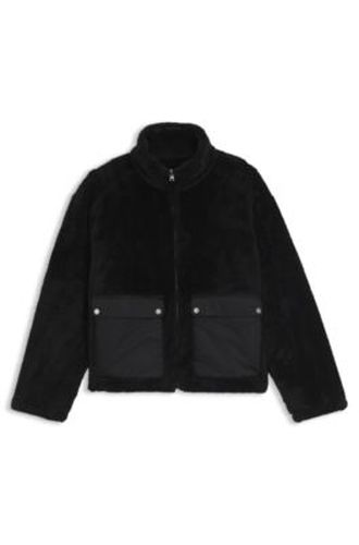Veste en fourrure synthétique avec poches plaquées contrastantes - HUGO - Modalova