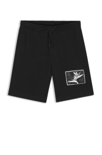Short en molleton de coton avec écusson artistique - HUGO - Modalova