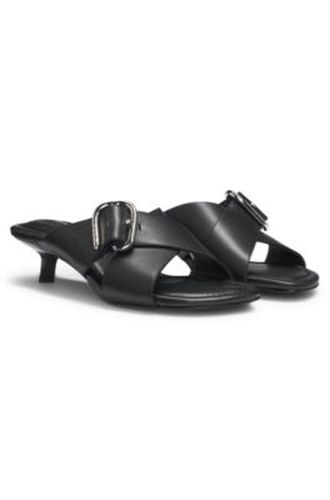 Mules en cuir avec brides croisées à boucle - HUGO - Modalova