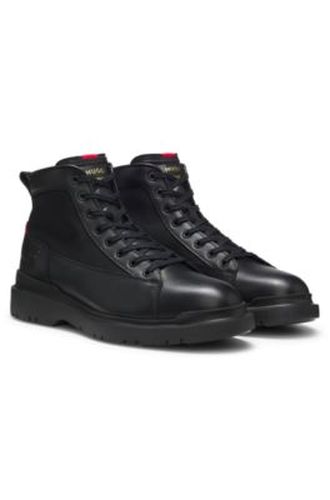 Bottines en cuir avec empiècements texturés - HUGO - Modalova