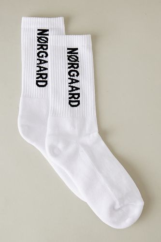 Chaussettes de sport à logo en White, chez Anthropologie - Mads Norgaard - Modalova