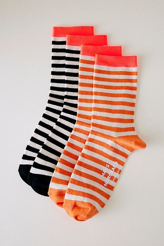 Chaussettes rayées en Orange chez Anthropologie - Mads Norgaard - Modalova