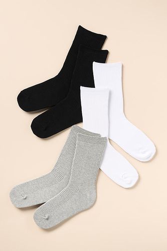 Ribbed Trouser Socks chez - Anthropologie - Modalova