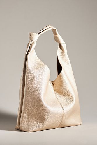 Knotted Slouchy Faux Leather Bag en Gold chez - Anthropologie - Modalova