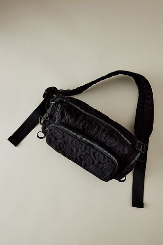 Sac de poche matelassé à fleurs en Black chez Anthropologie - Damson Madder - Modalova