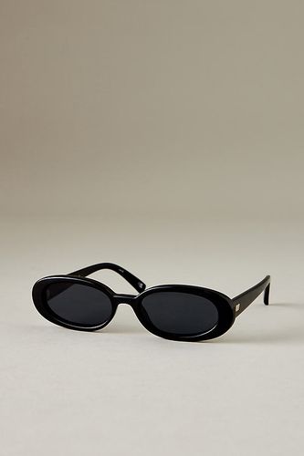 Lunettes de soleil ovales Outta Love en Black chez Anthropologie - Le Specs - Modalova