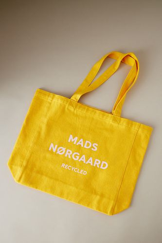 Sac fourre-tout en coton avec logo en Yellow, chez Anthropologie - Mads Norgaard - Modalova