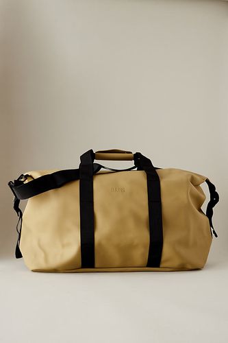 Sac de week-end imperméable Hilo en Beige chez Anthropologie - Rains - Modalova