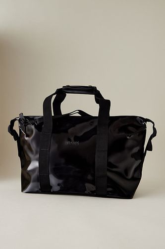 Sac de week-end imperméable Hilo en Black chez Anthropologie - Rains - Modalova