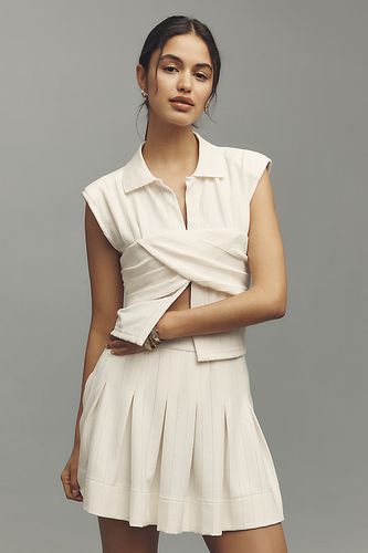 Mini Jupe Plissée en Maille à Pompons Bleus par en White taille: XS chez Anthropologie - Blue Tassel - Modalova
