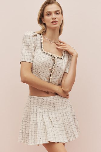 Zoela Jupe Mini Plissée en Beige taille: XS chez Anthropologie - ASTR The Label - Modalova