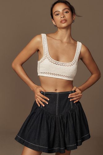 Jupe Mini en Denim à Taille Basque en , taille: M chez Anthropologie - Pilcro - Modalova