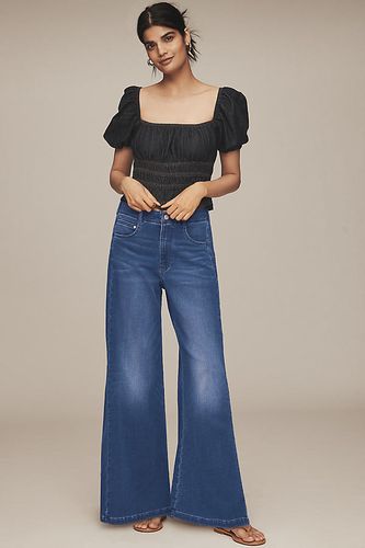 Le Jeans Flare Taille Mi-Haute Adi en Maille par en , taille: 27 chez Anthropologie - Pilcro - Modalova