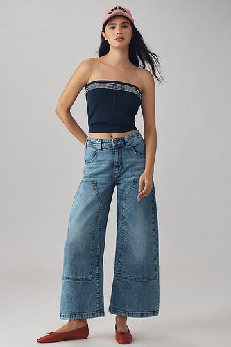 Le Jean Fuselé Taille Basse Myra par Pilcro: Édition Cheville en Blue, taille: 24 chez - Anthropologie - Modalova