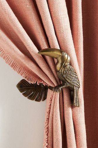 Attache dorée toucan en Brown taille: XS chez - Anthropologie - Modalova