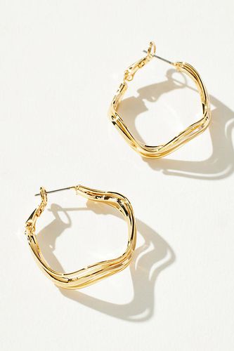 Boucles d'oreilles créoles courbées plaquées or par en Gold - By Anthropologie - Modalova