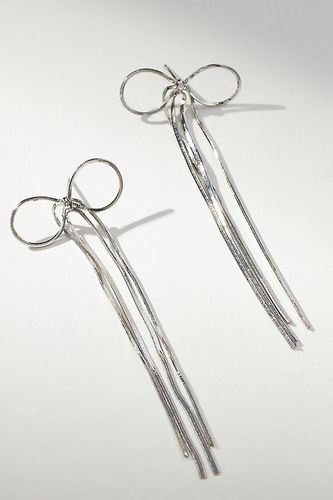 Boucles d'oreilles pendantes en métal Slinky avec naud par en Silver - By Anthropologie - Modalova