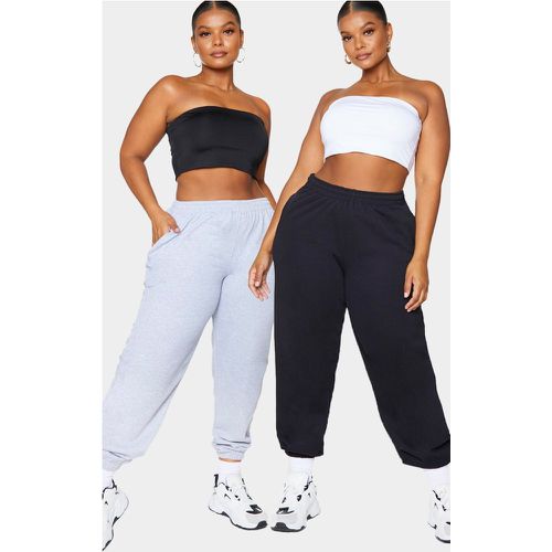 Plus Lot de 2 crop tops bandeau et blanc - PrettyLittleThing - Modalova