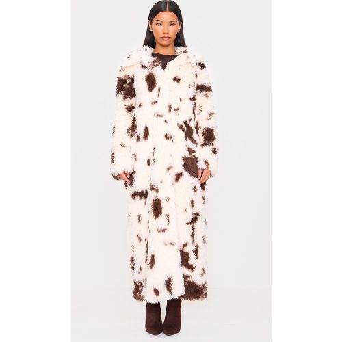 Manteau long en fausse fourrure imprimé vache - PrettyLittleThing - Modalova