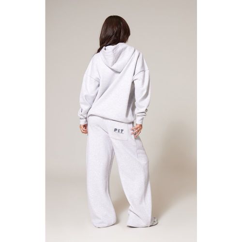 Jogging large imprimé PLT à poche arrière - PrettyLittleThing - Modalova
